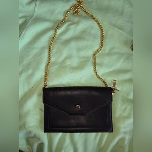 Sleek Black Crossbody Bag with Gold Chain